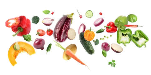 Gordijnen Flying organic vegetables on white background © Pixel-Shot
