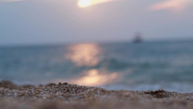 Waves on the sea during sunset. Relaxation, enjoyment. Journey to the ocean, peace and happiness. High quality 4k footage.
