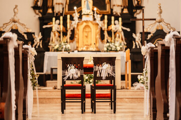 Church wooden bench. Interior view of a modern church with empty pews. Altar, organ, jesus. Wedding