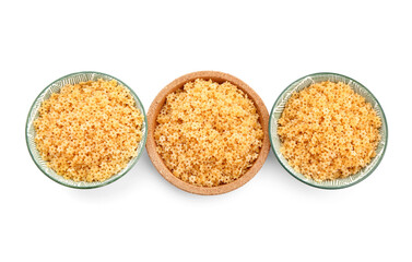 Bowls of raw stelline pasta isolated on white background