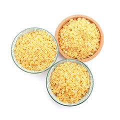 Bowls of raw stelline pasta isolated on white background