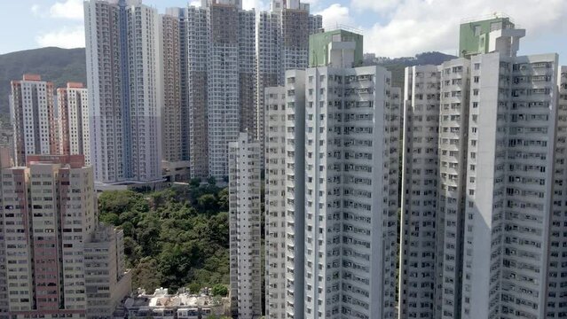 Aberdeen housing district. Hong Kong. Aerial view of tall buildings and skyscrapers. City scape drone shot. Popular tourist travel destination in Asia. China.