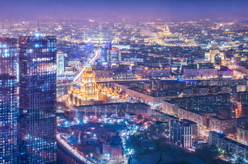 Obraz premium View of the city from the observation deck to skyscrapers in the light of night lights, Hotel and the Ministry of Foreign Affairs, Moscow City