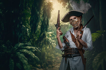 Fototapeta premium Art of buccaneer woman dressed in golden mask and costume on desert island.