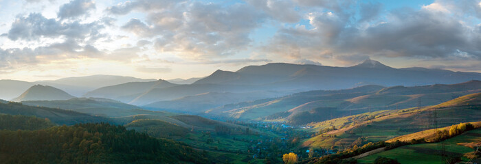 October evening Carpathian mountain country panorama.