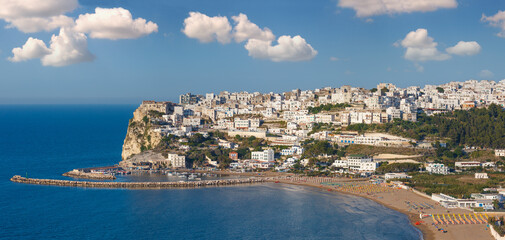 Obraz premium Summer sea perched Peschici beautiful town view, Gargano peninsula in Puglia, Italy. People unrecognizable.