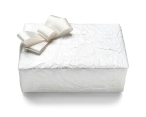 Beautiful gift box with silk bow on white background