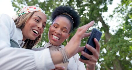 Friends with smartphone, funny post on social media and relax outdoor during coffee break, communication and technology. Women together in city, meme comedy and 5g network and happy news online