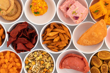 Mix Of Sweet Mithai And Salted Snacks Rose Kalakand, Laddu, Barfi, Chandrakala, Kesar Burfi, Jodhpuri Ladoo, Namakpare, Gujiya, Namak Para, Pink Gujia, Boondi, Buniya, Bhakarwadi - Festive Food Theme