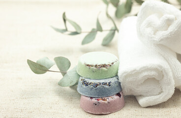 Close-up, multicolored handmade soap on a blurred background.