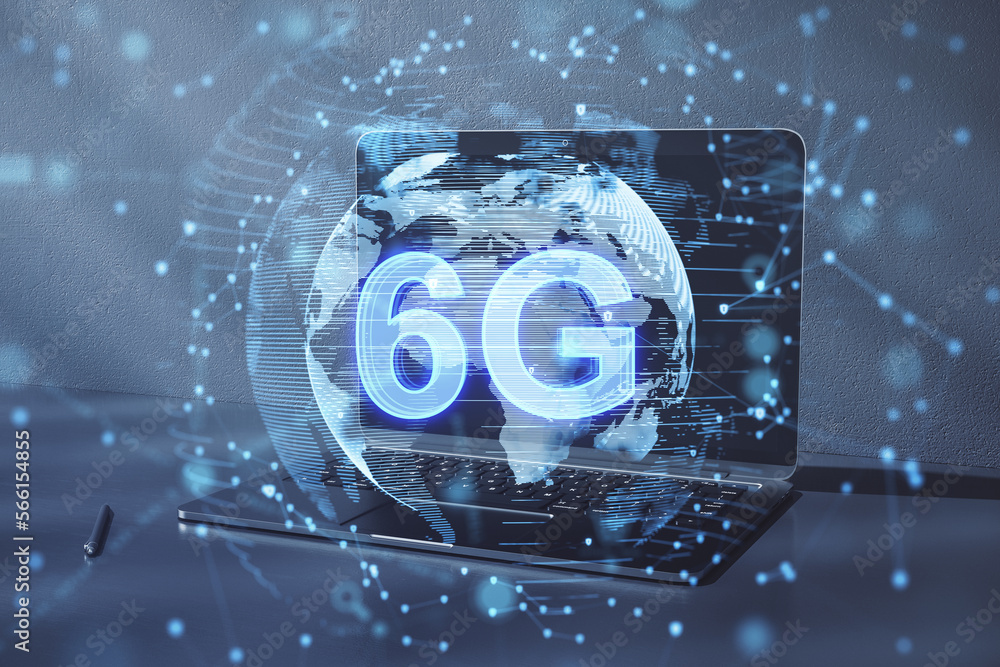 Poster close up of laptop with globe with 6g hologram on blurry background. telecommunication and internet 