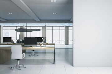 Fototapeta na wymiar Modern coworking office interior with blank mock up place on wall, wooden and concrete details, window with city view and daylight. 3D Rendering.