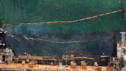 Top view of the deck of the sunken ship. The collapse of an oil tanker. Pollution of the World...