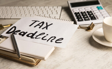 The inscription TAX Deadline on the desktop.