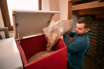 Pellet boiler system. Biomass heating systems generate heat from biomass. Renewable energy and...