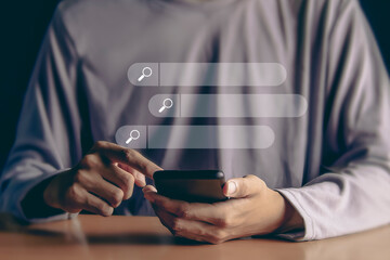 Searching the internet with a search bar working on a smartphone, internet network concept.