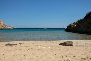 Panoramic view of the white stunning turquoise sandy beach of Kolitsani View in Ios Cyclades Greece