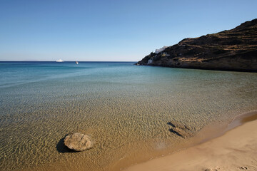 Fototapeta na wymiar The stunning turquoise sandy beach of Kolitsani View in Ios Cyclades Greece