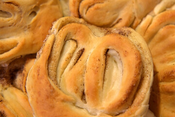 Pastry. Variety of sweet pastry. Bakery shop. Baked products. Freshly toasted buns with cinnamon...
