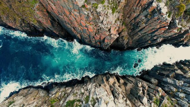 Cape Hauy Drone Flys Down In Between Cliffs in Tasmania, Australia