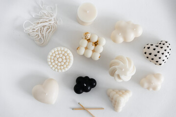 shaped candle. Handmade candles in a modern style, beautifully shaped. Shaped like bubbles, cloud, pyramid, human, heart. Home Decor.