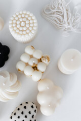 shaped candle. Handmade candles in a modern style, beautifully shaped. Shaped like bubbles, cloud, pyramid, human, heart. Home Decor.