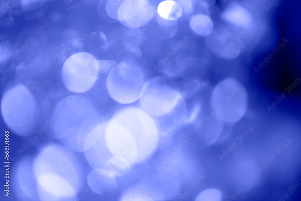 Wall mural abstract background with bokeh on blue background copy space