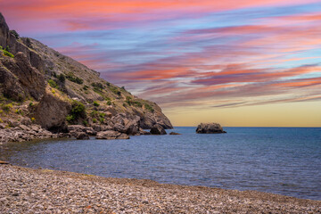 Obraz premium Seascape with rocks on the background of water