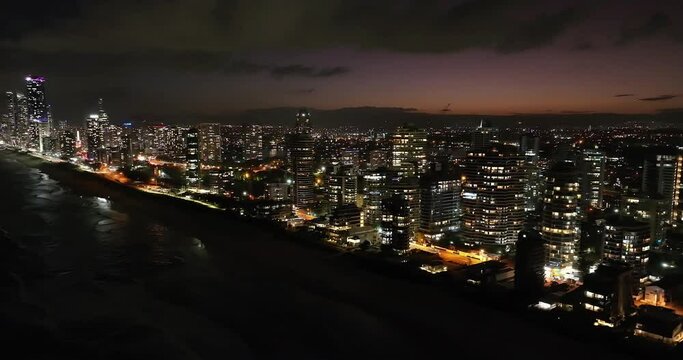 Amazing sunset and twilight cityscape of the Sufers Paradise beach front. Iconic Gold Coast scene