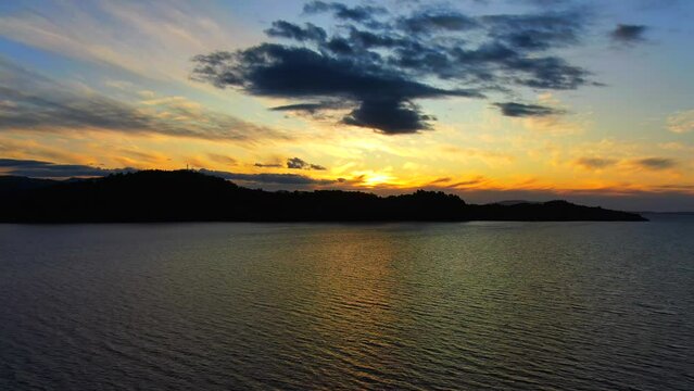 Aerial view of sunset over Villarrica Lake in Pucon Chile. Beautiful, picturesque scene in South America.