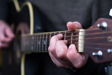person playing guitar