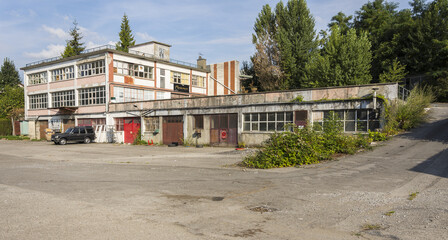 Abandoned factory where nature has taken over