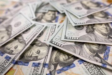 rich conept background of 100 us dollar banknotes