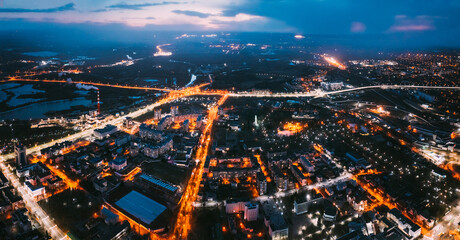 Brest, Belarus. Aerial Bird's-eye View Of Brest Cityscape Skyline. Night Traffic In Residential District.