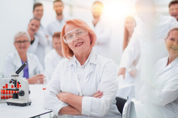 Fototapeta premium tight-knit team of a scientific laboratory in the workplace.
