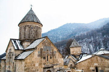 Christian church in the forest. Old monastery complex. Apostolic church - obrazy, fototapety, plakaty