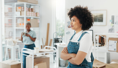Motivation, goal and business woman looking happy and proud in a startup company office. Leader, vision and small business owner enjoying her career success at new workspace, empowered and powerful