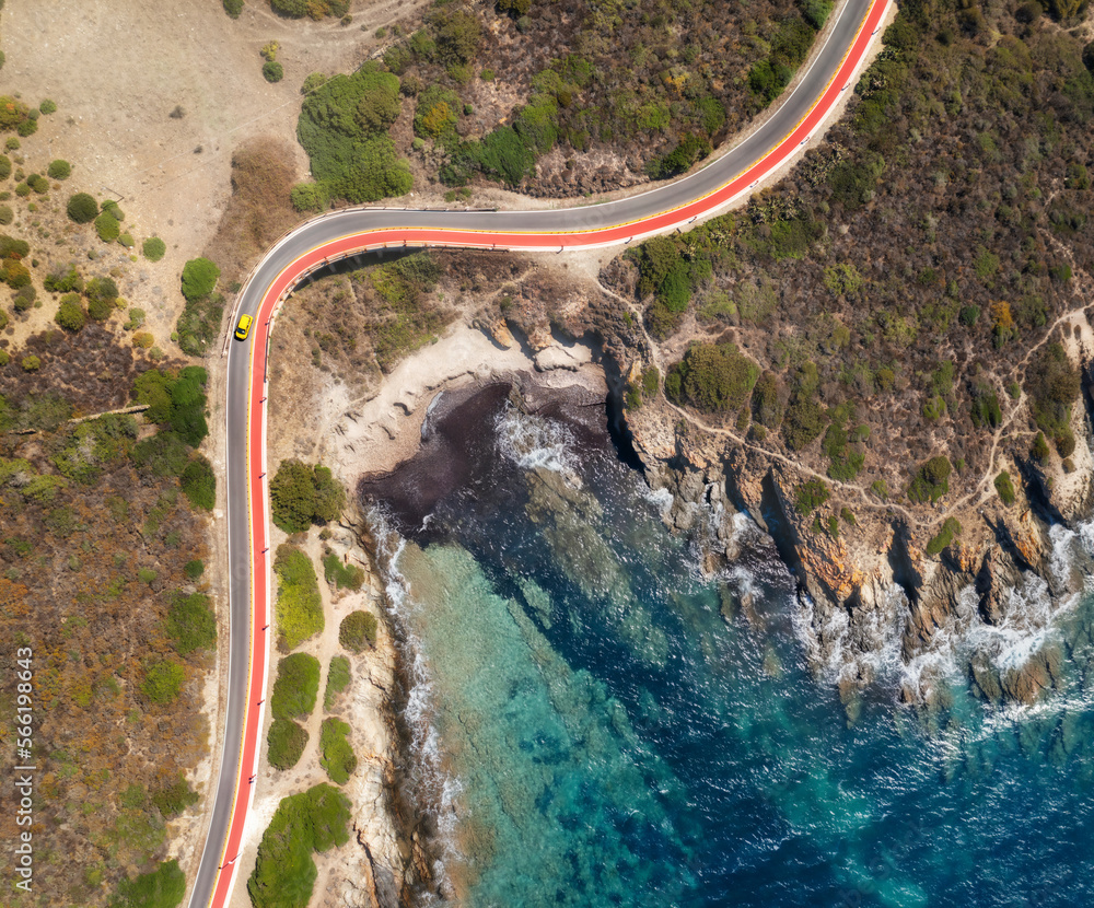 Canvas Prints beautiful sea coast and road with yellow car in summer time. view of the road along the coast from t