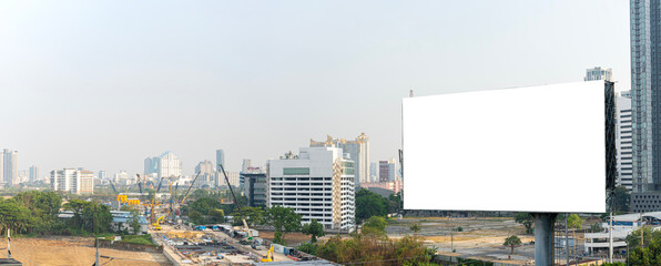 Mock up. Blank white billboard for advertisement on the residential area. Blank white billboard on...