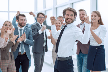 Fototapeta premium happy young businessman on business team background.