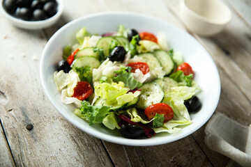 Healthy vegetable salad with olives