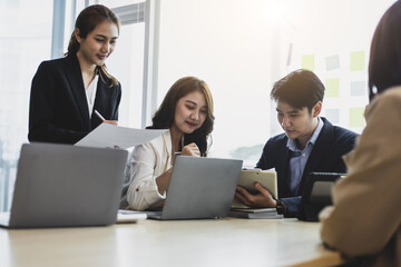 Business partnership meeting, Colleagues meeting to discuss project planning and market research for business profit growth. Collaboration of people in the organization.