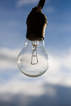 A light bulb hangs in a window in the small town of Benito Juarez in the Sierra Norte Mountains, Oaxaca state, Mexico.