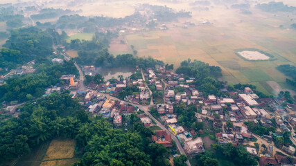 Aerial landscape view of a village in India, drone shot of Rural India during sunset or sunrise