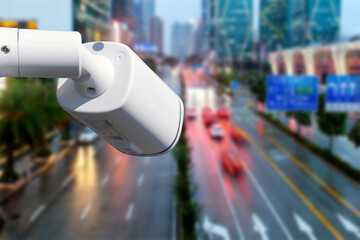 Closeup of traffic security camera surveillance CCTV on the road in the big city.