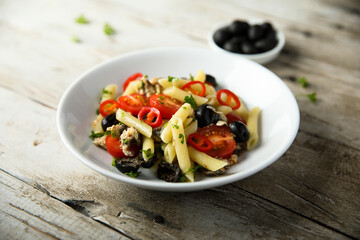 Pasta with tomatoes and olives