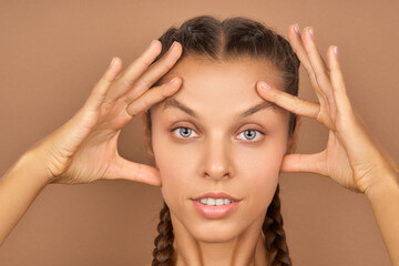 Fototapeta premium Natural beauty. Beautiful young woman. Smooth skin care concept.