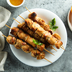 Homemade chicken skewers with orange