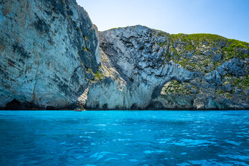 Obraz na płótnie Canvas Fantastic view of the magnificent play of colors off the coast of Zakynthos with its crystal clear turquoise water and high cliffs rising from the sea