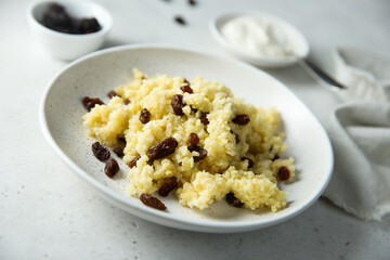Homemade millet porridge with raisins